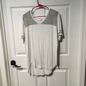 White and Grey T-Shirt with a long cut.